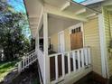 View of house with steps to a covered porch at 116 Dunstan Ave, Durham, NC 27707