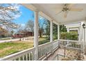 Comfortable covered porch featuring a ceiling fan and views of the street at 1115 Wake Forest Rd # B, Raleigh, NC 27604