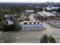 Aerial view of modern townhomes in a vibrant community setting at 1310 Chamblee Hill Ct, Raleigh, NC 27608