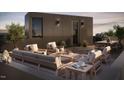 Relaxing rooftop patio with comfortable seating and outdoor grill at 1310 Chamblee Hill Ct, Raleigh, NC 27608