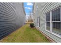 Well-maintained side yard offers a private outdoor space at 1701 Legendary Ln, Morrisville, NC 27560