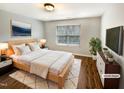 Bright bedroom featuring a comfortable bed, stylish furniture, and neutral decor at 1756 Main Divide Dr, Wake Forest, NC 27587
