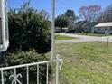 Picture from porch showing neighboring houses and quiet street at 214 Grace St, Oxford, NC 27565