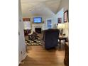 Cozy living room with hardwood floors, a fireplace, and comfortable seating at 254 Pedernales Dr, Smithfield, NC 27577
