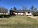 Charming single-story home featuring a brick facade, front yard, and inviting entrance at 3132 Fields Dr, Raleigh, NC 27603