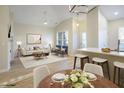 Bright and airy living room featuring vaulted ceilings, stylish furniture, and modern decor at 11327 Shadow Elms Ln, Raleigh, NC 27614