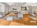 Spacious, staged living room with lots of light and ample seating at 12 Stonegate Dr, Angier, NC 27501