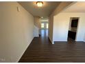 Modern entryway with beautiful wood floors and neutral paint, creating a bright, inviting space at 120 W Victory View Ter # 51, Smithfield, NC 27577