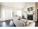 Open living room with a fireplace and a view of the front door at 124 Kipling Dr, Oxford, NC 27565