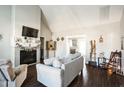Cozy living room showcasing a fireplace with decorative mantle and ample seating space at 124 Kipling Dr, Oxford, NC 27565