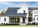 Close-up of exterior showing the address, front door, and manicured lawn at 1421 Sky Vista Way, Raleigh, NC 27613