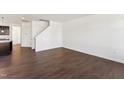Bright and spacious living room featuring gorgeous flooring and neutral walls at 1432 Cooper St, Sanford, NC 27330
