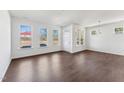 Bright living room featuring large windows and contemporary finishes at 1432 Cooper St, Sanford, NC 27330