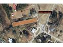 Aerial shot of property at 2984 Ashe Ave, outlining the plot and its location relative to nearby roads at 2984 Ashe Ave, Dunn, NC 28334