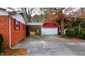 This home has a very long driveway and a detached two car garage at 4709 Stafford Dr, Durham, NC 27705