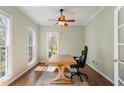 Home office features hardwood floors, neutral walls, and natural light at 501 Nantucket Dr, Cary, NC 27513