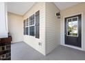 Charming entryway with a black front door and decorative shutters at 5344 Salem Woods Dr # 20, Graham, NC 27253