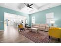 Bright living room featuring an open floor plan, modern decor, and abundant natural light at 74 Silver Moon Ln, Clayton, NC 27527