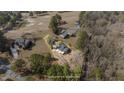 Expansive aerial view highlighting the property's location and surrounding greenery at 75 Traceway N, Sanford, NC 27332