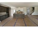 Spacious kitchen with a large island, modern appliances, and ample cabinet space at 20 Diamond Creek Dr, Zebulon, NC 27597