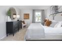 Cozy bedroom offers a neutral color scheme and a serene ambiance at 2148 Monk Dr, Haw River, NC 27258
