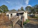 Bungalow exterior featuring a charming front porch with ramp access at 306 Martin Luther King Jr Dr, Smithfield, NC 27577