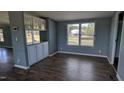 Dining area featuring built-in cabinets, neutral walls, and a window to let the light in at 4600 Strawbush Rd, Spring Hope, NC 27882