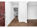 Bright hallway with hardwood floors offers a clean and inviting transition between rooms at 5013 Kristie Ln, Nashville, NC 27856