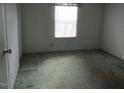 Cozy bedroom with a window offering natural light and closet space at 65 Aunt Bibba Way, Youngsville, NC 27596