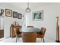 Cozy dining room with stylish furniture and unique decor at 7205 Sandy Creek Dr, Raleigh, NC 27615