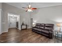 Spacious living room boasting high ceilings, stylish flooring, and a comfortable leather sofa at 309 Old Farm Dr, Graham, NC 27253
