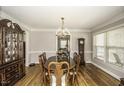 Traditional dining room with hardwood floors, chandelier, and ample natural light at 45 Wimberly Ave, Rocky Mount, NC 27804