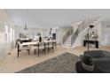 Open-concept space with dining area, modern kitchen, and staircase, perfect for entertaining and Gathering life at 612 Lakeview Dr, Raleigh, NC 27603