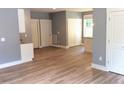 Spacious living room features hardwood floors, neutral paint, and ample natural light at 8 Elaine Cir, Durham, NC 27703