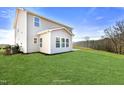 Large, grassy backyard offering plenty of space for outdoor enjoyment and relaxation at 8729 Maxine St # 38, Willow Springs, NC 27592