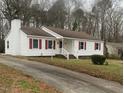 A view of a lovely single-story house, driveway and neatly manicured front yard at 912 Pamela Ln, Rocky Mount, NC 27803