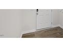 The entryway features wood-look flooring and a white front door at 172 Starlight St, Sanford, NC 27330