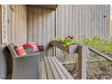 Charming porch with comfortable seating, colorful flower box, and a 'Welcome' sign at 198 Ridge Trl, Chapel Hill, NC 27516