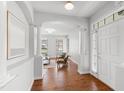 Welcoming foyer featuring hardwood floors and arched doorways at 2024 Heritage Pines Dr, Cary, NC 27519