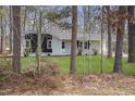 Beautiful single-story home with brick exterior and lush green lawn at 2312 Valley Rd, Sanford, NC 27330