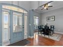 Welcoming foyer with a view of the dining area, showcasing elegant hardwood floors at 1046 Lawrence Rd, Wake Forest, NC 27587