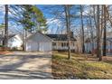 Delightful single story home with a two-car garage, a concrete driveway, and a cozy front porch at 1107 Goldendale Dr, Durham, NC 27703