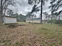 Spacious backyard with a storage shed and plenty of room for outdoor activities at 4989 Nc 217, Erwin, NC 28339