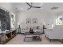 Cozy living room featuring neutral tones, stylish decor, and plush seating arrangements at 517 Coleman St, Raleigh, NC 27610