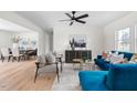 Spacious living area with hardwood floors, stylish furniture, and an open floor plan at 546 Hickory Ln, Burlington, NC 27217