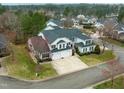 Aerial view of neighborhood, highlighting the home's location and well-maintained surroundings at 58 Lake Village Drive Dr, Durham, NC 27713