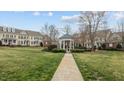 Beautiful community area with a gazebo and lush landscaping, ideal for relaxation and social gatherings at 1203 Fairview Club Dr, Wake Forest, NC 27587