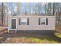 Cozy single-story house with a traditional facade and well-placed windows at 158 Torain St, Hillsborough, NC 27278