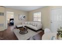 Bright living area featuring a white sofa and stylish decor at 158 Torain St, Hillsborough, NC 27278