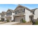 Inviting two-story home featuring a well-manicured lawn and a welcoming front entrance at 211 Explorer Dr # 263, Morrisville, NC 27560